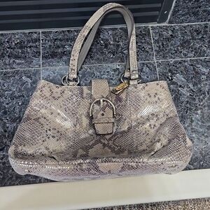 Vintage COACH bag in excellent condition comes from a no-smoking home.